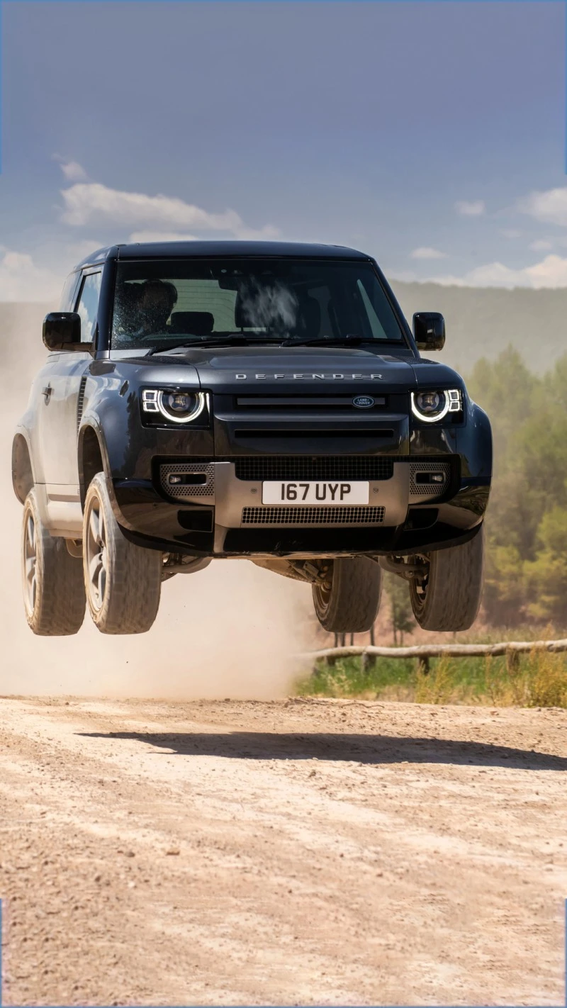 Land Rover Defender in Mid-Air 4K Mobile Wallpaper