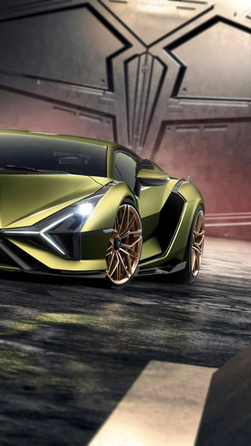 Gold Lamborghini in Industrial Setting 4K Mobile Wallpaper