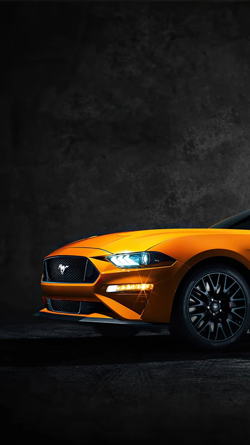 Orange Mustang in Dark Setting 4K Mobile Wallpaper