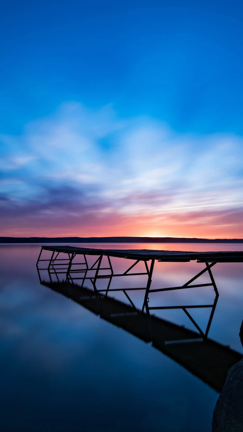 Sunrise over Calm Water 4K Mobile Wallpaper
