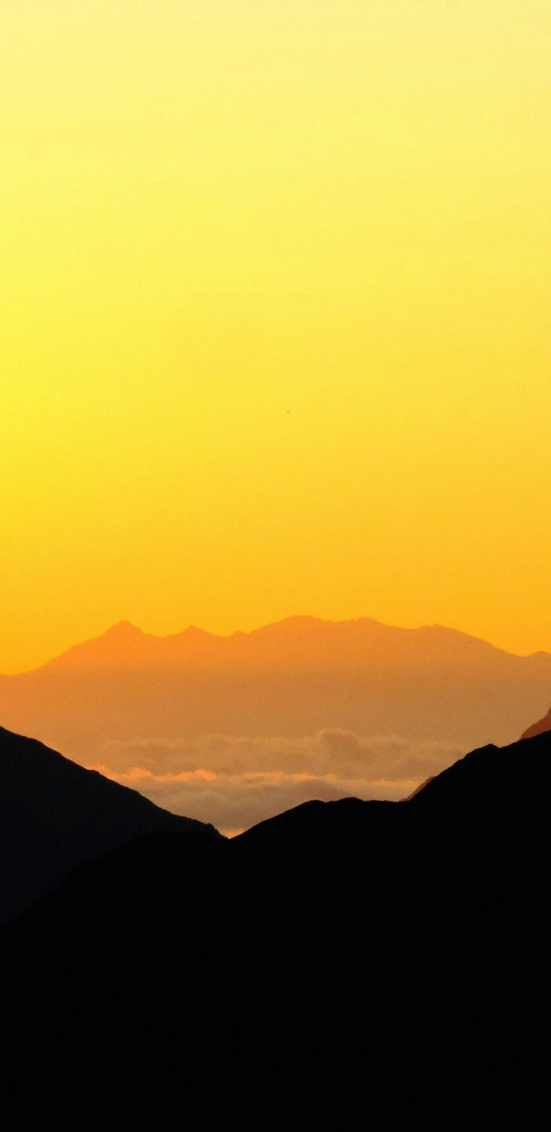 Silhouette of Mountains at Sunrise 4K Mobile Wallpaper
