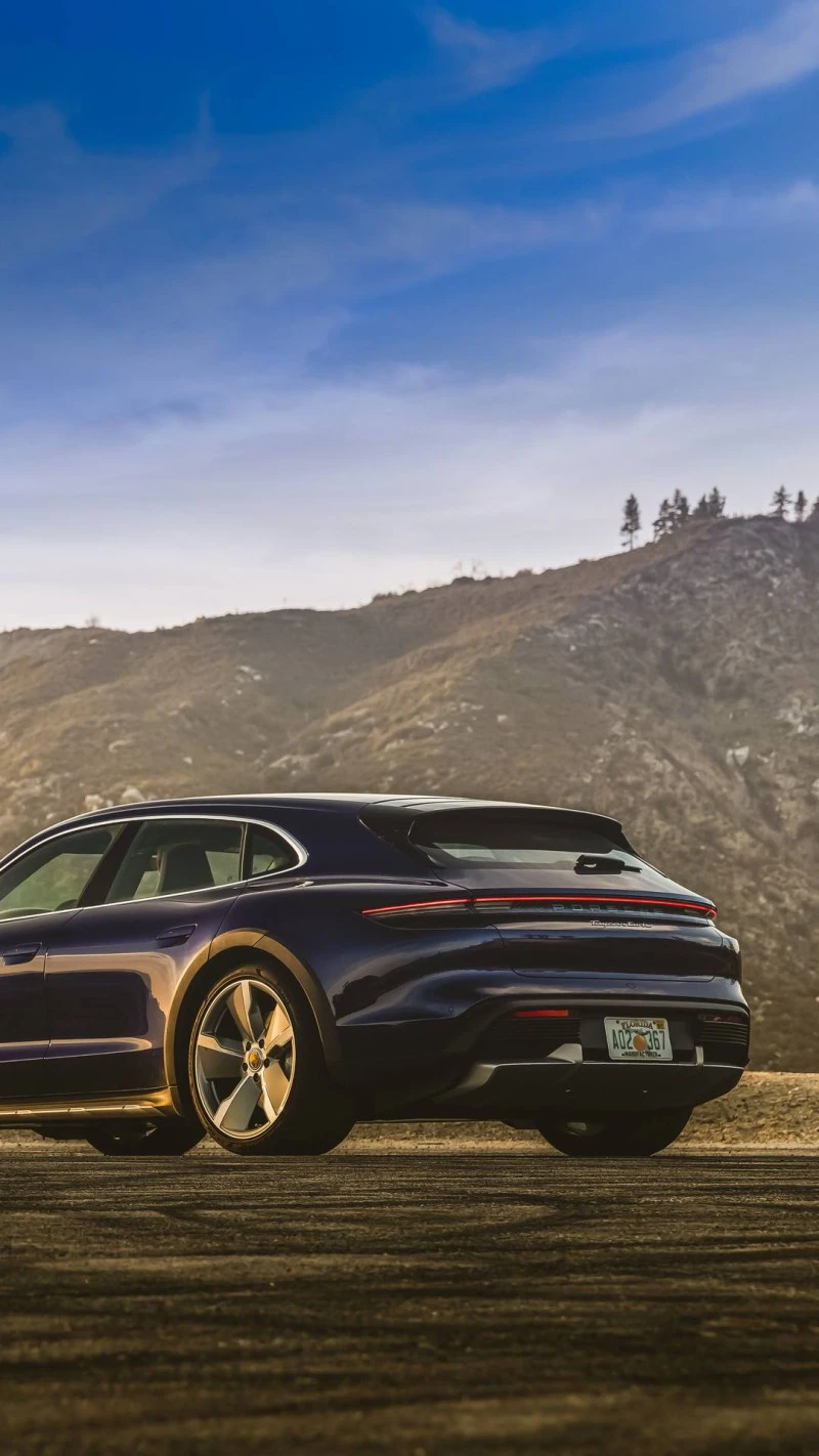 Porsche Taycan Cross Turismo in Mountainous Setting 4K Mobile Wallpaper