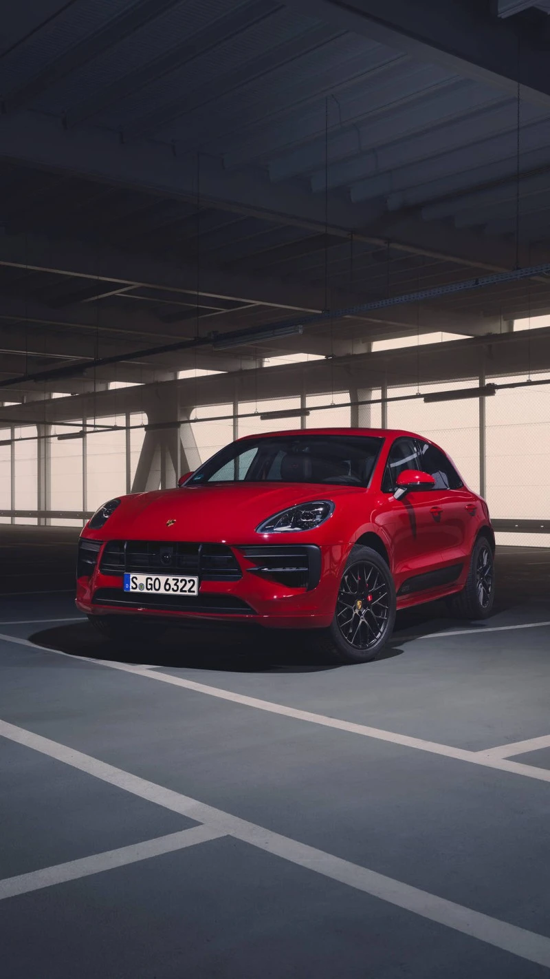 Red Porsche Macan in Parking Garage 4K Mobile Wallpaper