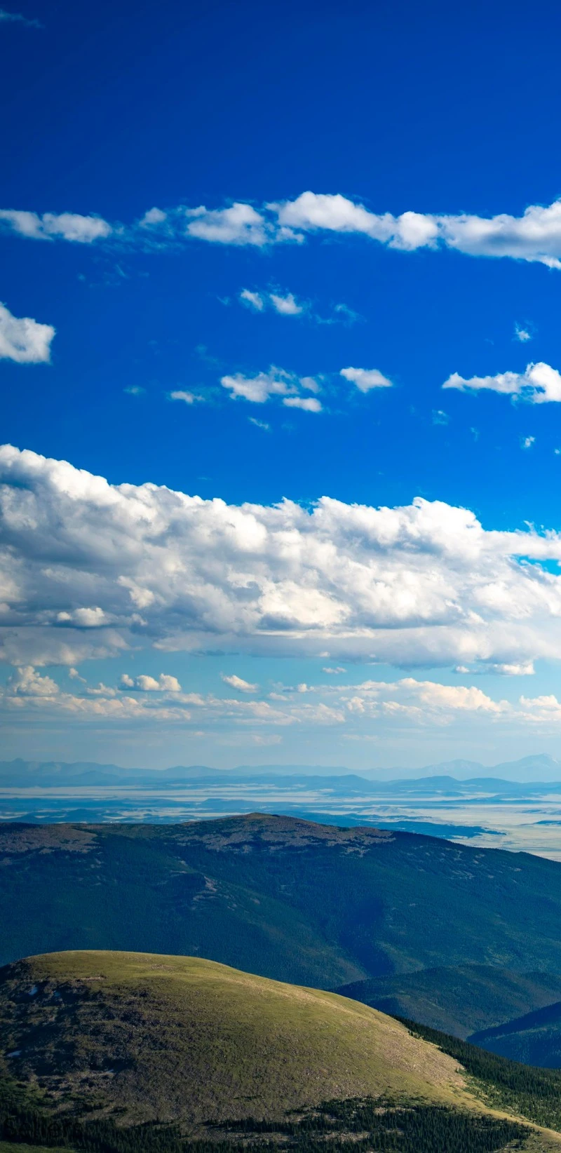 Mountain Vista Under a Blue Sky 4K Mobile Wallpaper