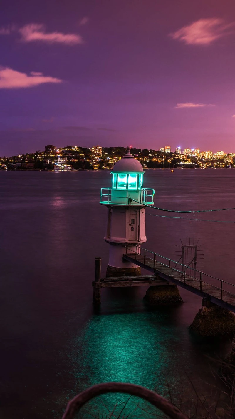 Nighttime Lighthouse 4K Mobile Wallpaper