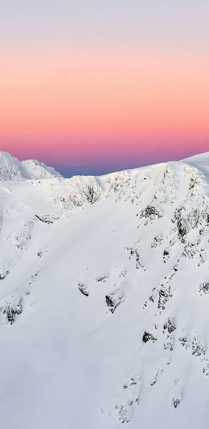 Pink Sunset over Snowy Mountains 4K Mobile Wallpaper