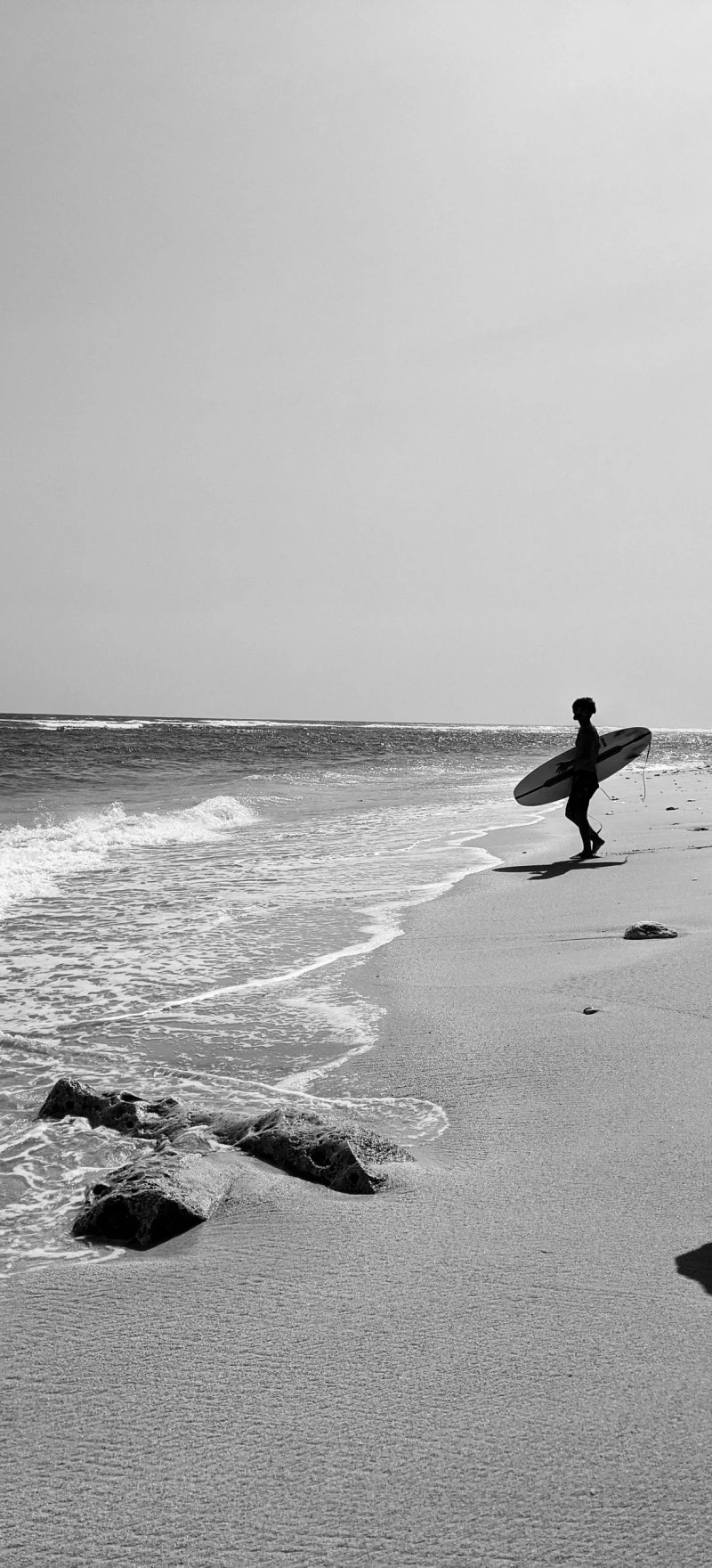 Solitary Surfer 4K Mobile Wallpaper