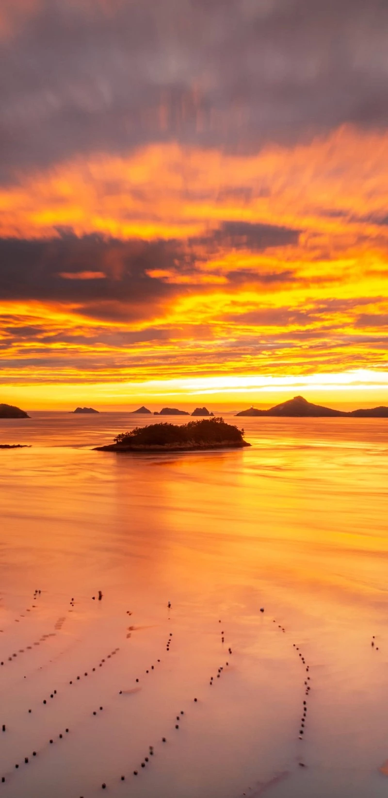 Golden Sunrise over Coastal Islands 4K Mobile Wallpaper