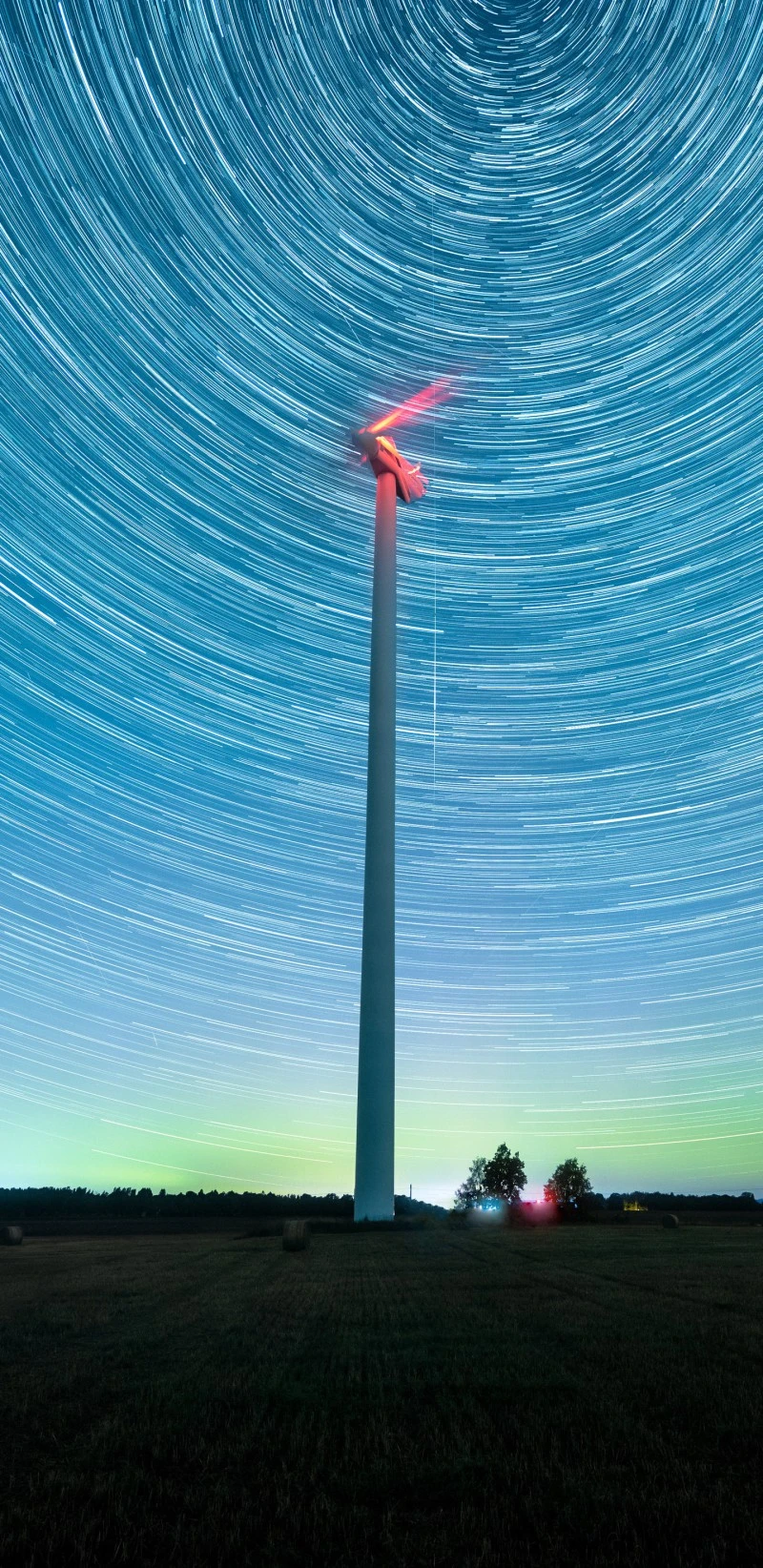 Star Trails and Wind Turbine 4K Mobile Wallpaper