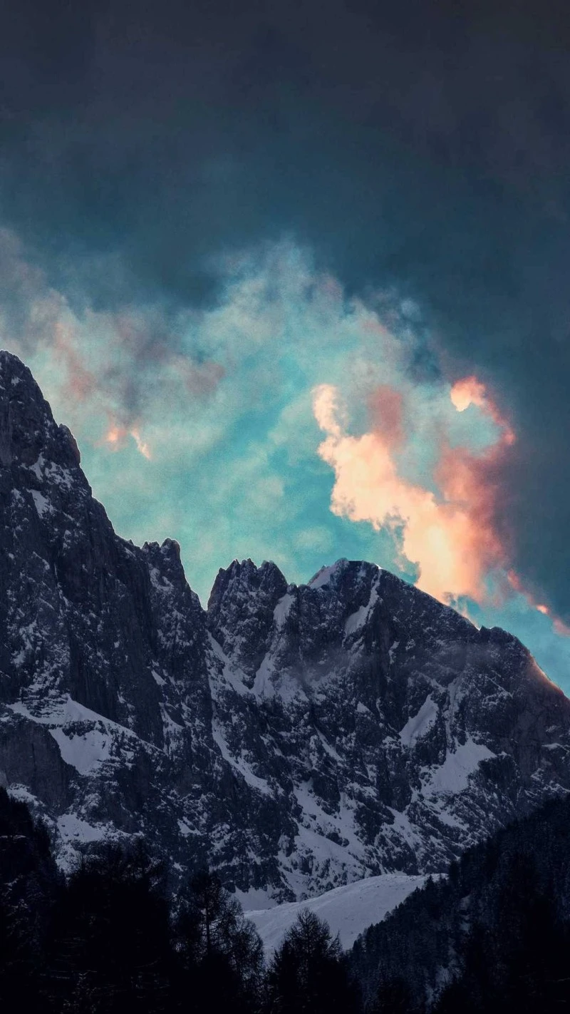 Dramatic Sunset Over Snow-Capped Peaks 4K Mobile Wallpaper