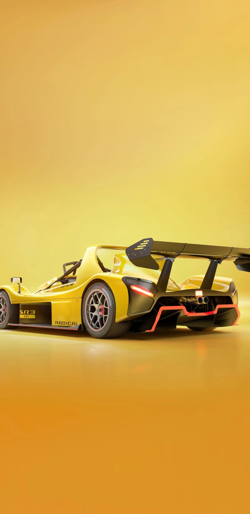 Rear View of a Yellow Radical RXC Race Car 4K Mobile Wallpaper