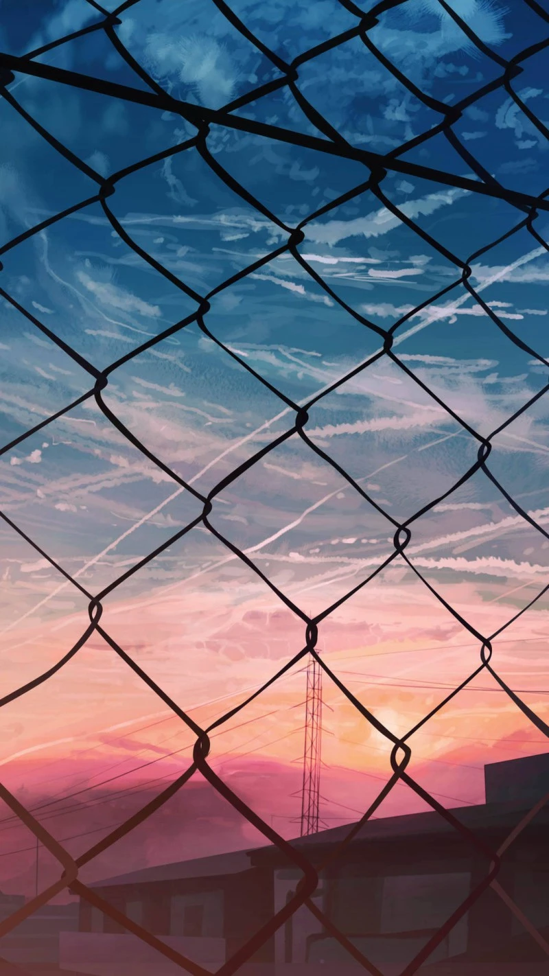Sunset Through a Chain-Link Fence 4K Mobile Wallpaper