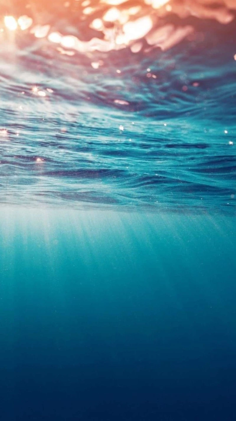 Sunbeams Beneath the Waves 4K Mobile Wallpaper