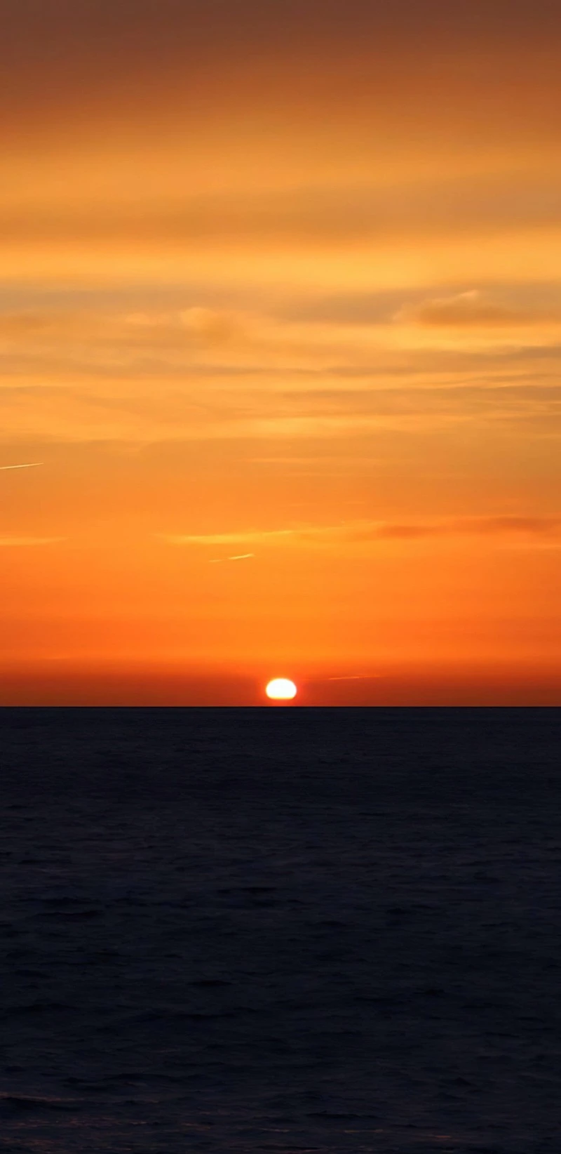 Sunset at Sea 4K Mobile Wallpaper