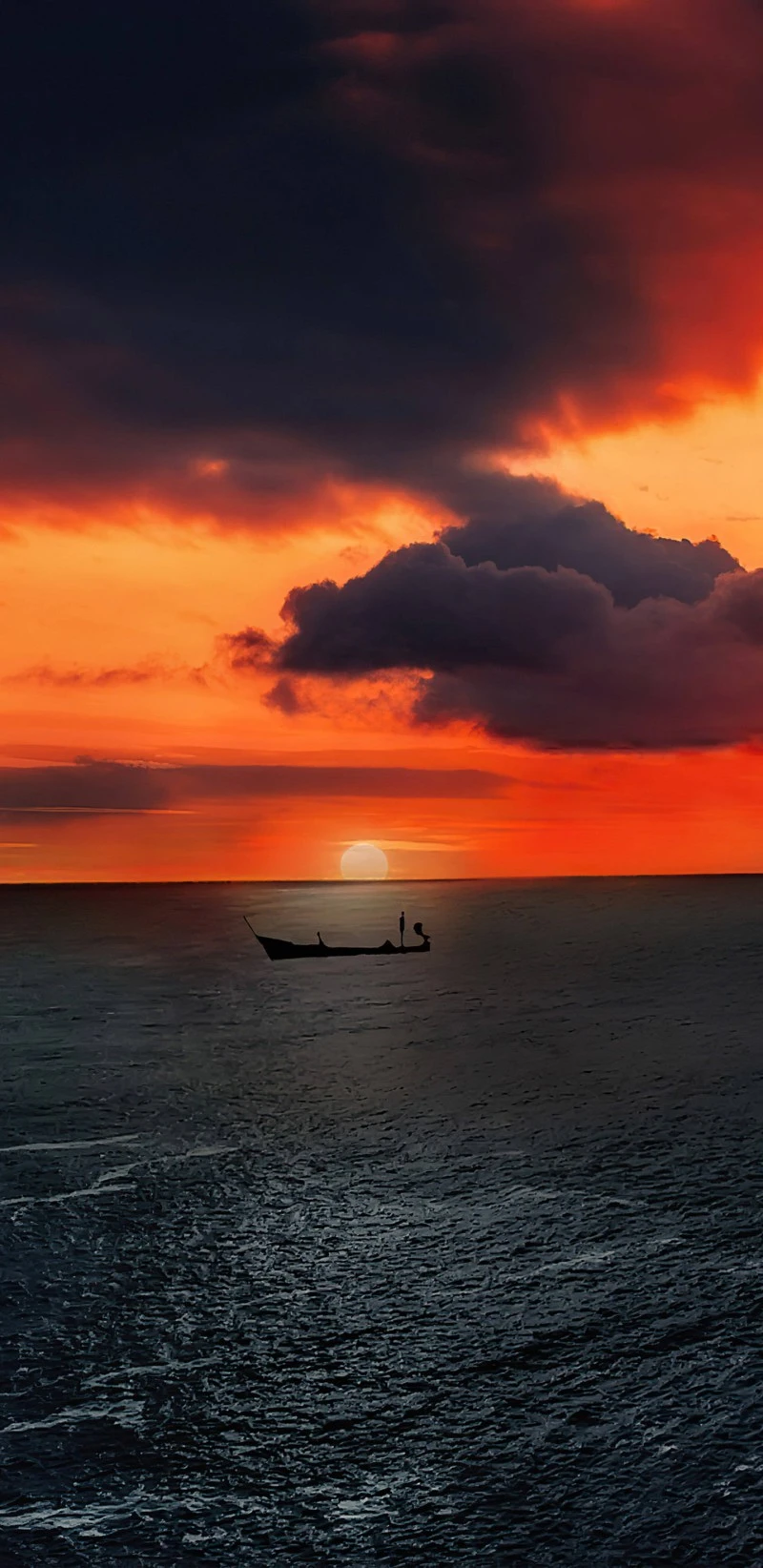 Solitary Boat at Sunset 4K Mobile Wallpaper