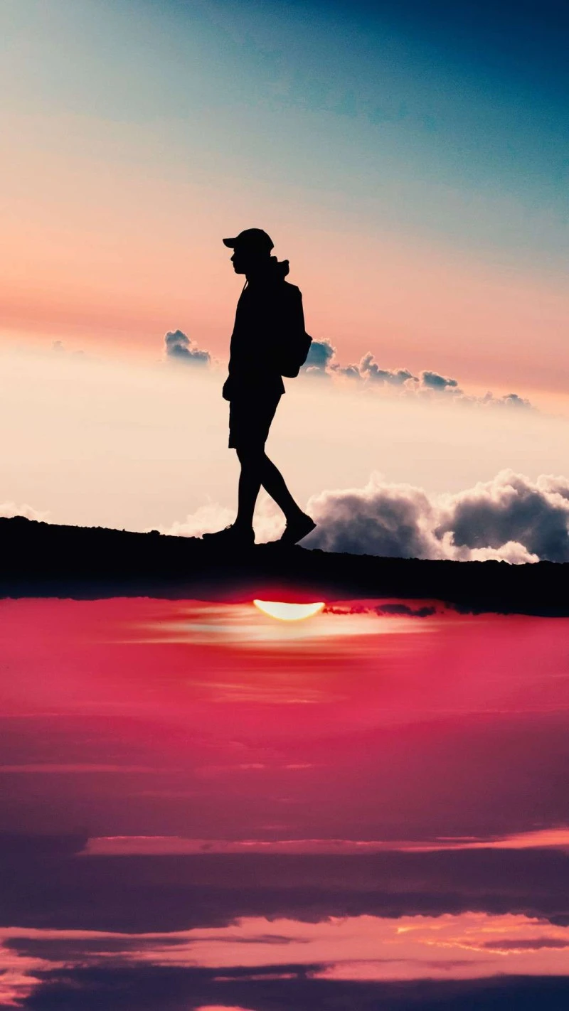 Hiker at Sunset 4K Mobile Wallpaper