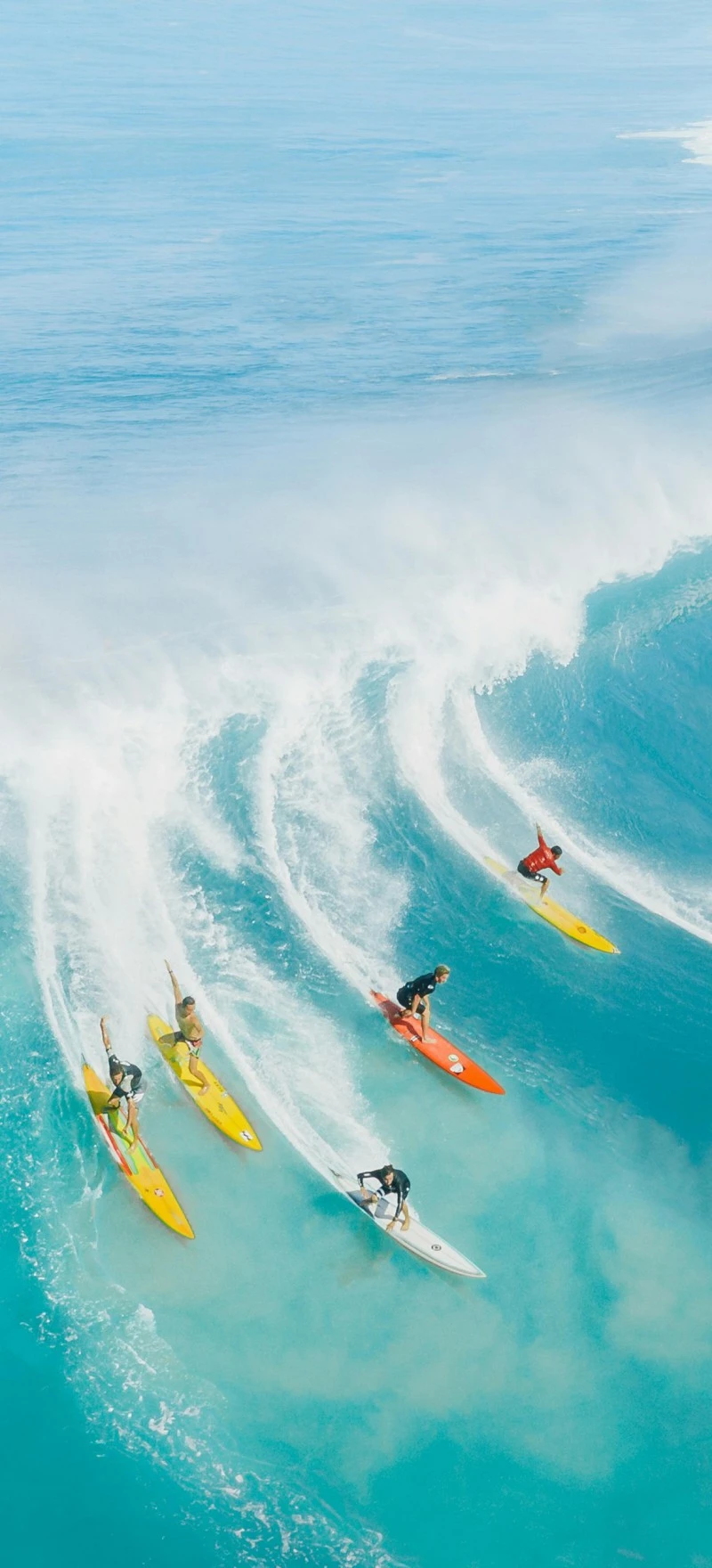 Surfers Riding Parallel Waves 4K Mobile Wallpaper