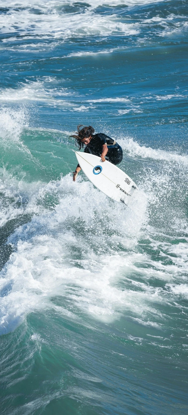 Surfer Performing an Aerial Maneuver 4K Mobile Wallpaper
