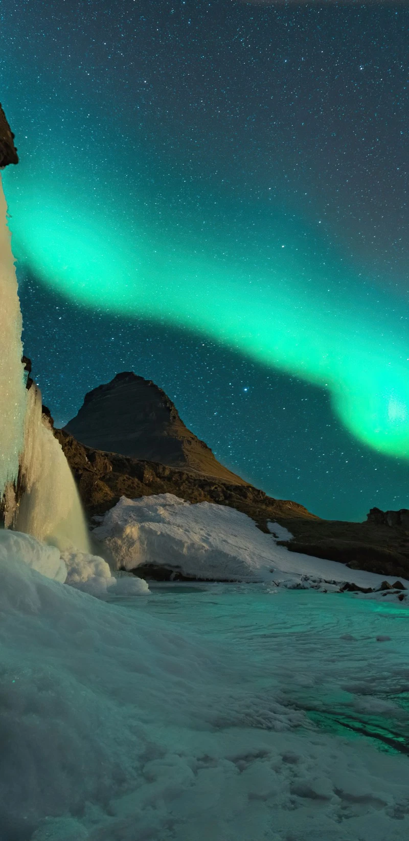 Aurora Borealis over Frozen Waterfall 4K Mobile Wallpaper